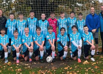 Local business supports youth football team