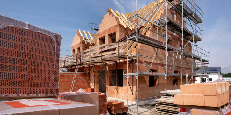 Report slams council housing firm over debt and failure to build