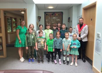 Schoolchildren wear green to support community campaign