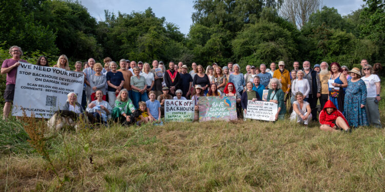 Residents rally to protect green space from housing