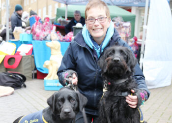 Guide dog puppy raisers encourage others to volunteer